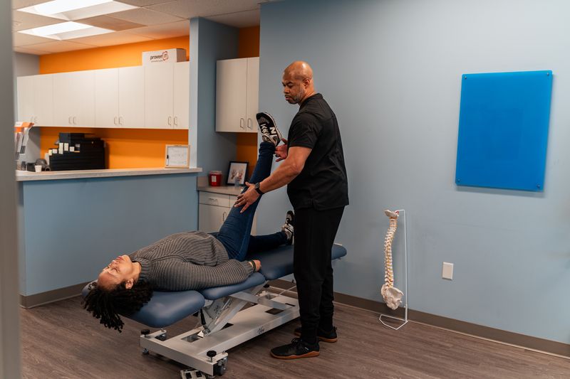 Manual therapy session focusing on the upper back and shoulders
