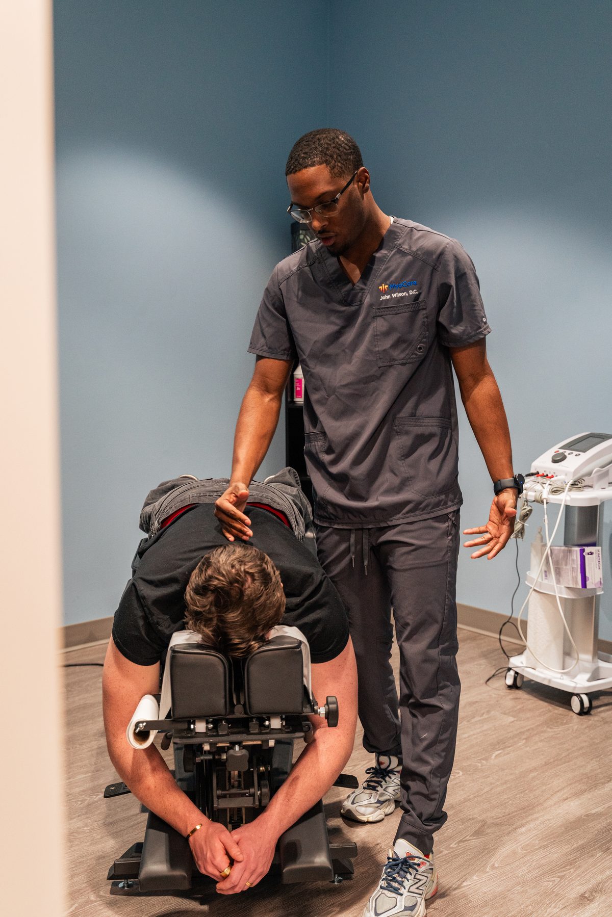 Chiropractic treatment session focused on the lumbar spine